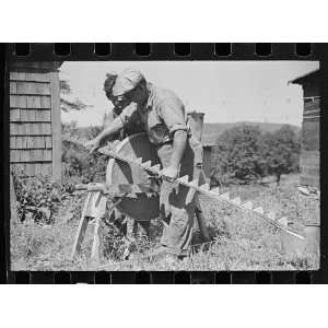   mowing machine on farm near Hyde Park, Vermont 1936