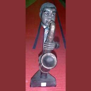  Large African Sax Player 