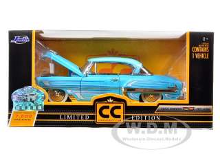 Brand new 124 scale diecast model car of 1953 Chevrolet Bel Air Blue 
