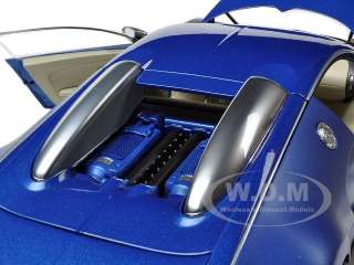   model car of bugatti eb veyron 16 4 bleu centenaire 2009 by autoart