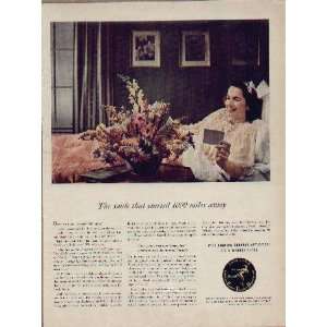 The smile that started 1000 miles away  1941 F.T.D. Florists Ad 