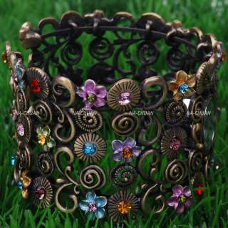 the watch is decorated with multicolour brilliant rhinestone, very 