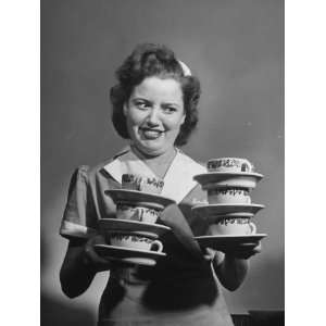  Waitress Demonstrating How to Stack Coffee Cups 