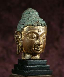 BUDDHA HEAD OF TIBETAN SHAKYAMUNI, GILDED BRONZE, SUPERB PATINA, late 
