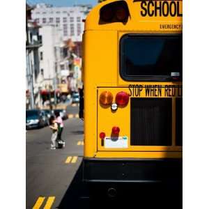  Rear View of School Bus Driving Along Street in San Francisco 