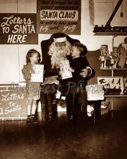 VERY OLD SANTA CLAUS AT THE CHRISTMAS TOY STORE PHOTO  