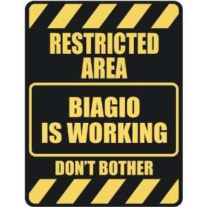   RESTRICTED AREA BIAGIO IS WORKING  PARKING SIGN