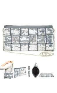 sleek arm candy shimmer shine clutch features storm colored seatbelts 
