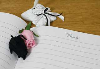 This elegant guest book finished in white flowered hearts and 