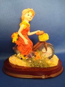 Girl Woman Riding Bicycle Figurine Statue Wooden Base  