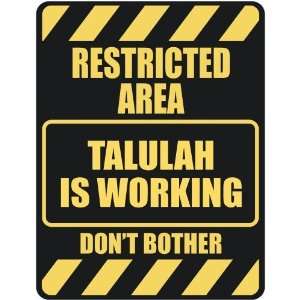   RESTRICTED AREA TALULAH IS WORKING  PARKING SIGN