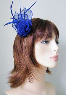   BLUE FLOWER SHAPED SINAMAY AND FEATHER HAIR FASCINATOR ON SPRUNG CLIP