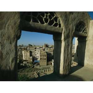  Ancient Buildings of Sanaa are Framed Through a Window 