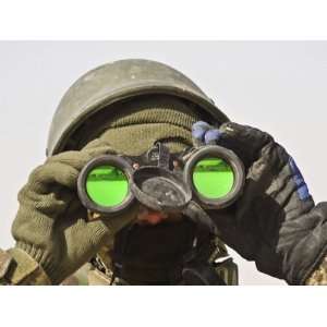  An Afghan Soldier Scans the Horizon for Enemy Movements 