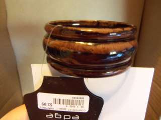 Tones of Brown Plastic Bangle Bracelet. 1 1/4 wide  2 3/4 Center 