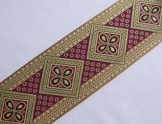 This wide trim combines flowers and a geometric design in a jacquard 