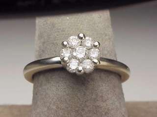  from 14k white gold with an approx 12 ct diamond set in the center and