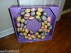 pastel easter egg and twig wreath speckled muted eggs and