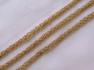 An elegant, hand made trim. Fashioned from metallic, lurex covered 