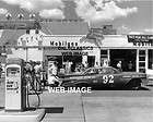 1959 mobil gas station pump auto racing pontiac stock car