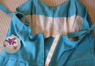 Adorable Lee Swimplay 50s swimsuit in a brilliant turquoise and 