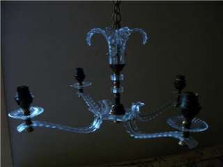 This gorgeous frou frou 4 arm light fitting was made in France in 
