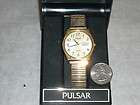 vtg Pulsar by Seiko Quartz Mens Day Date Gold Watch w Box & Book 