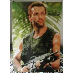 Arnold Schwarzenegger poster 21 x 31 carrying gun from Predator era 