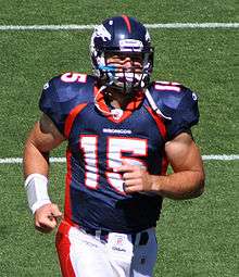 Tebow during warm ups with the Denver Broncos at Sports Authority 
