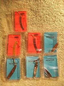 LOT OF 7 NEW JIGGING SPOONS IN PACKAGES,FISHING LURES,ICE OR SUMMER 